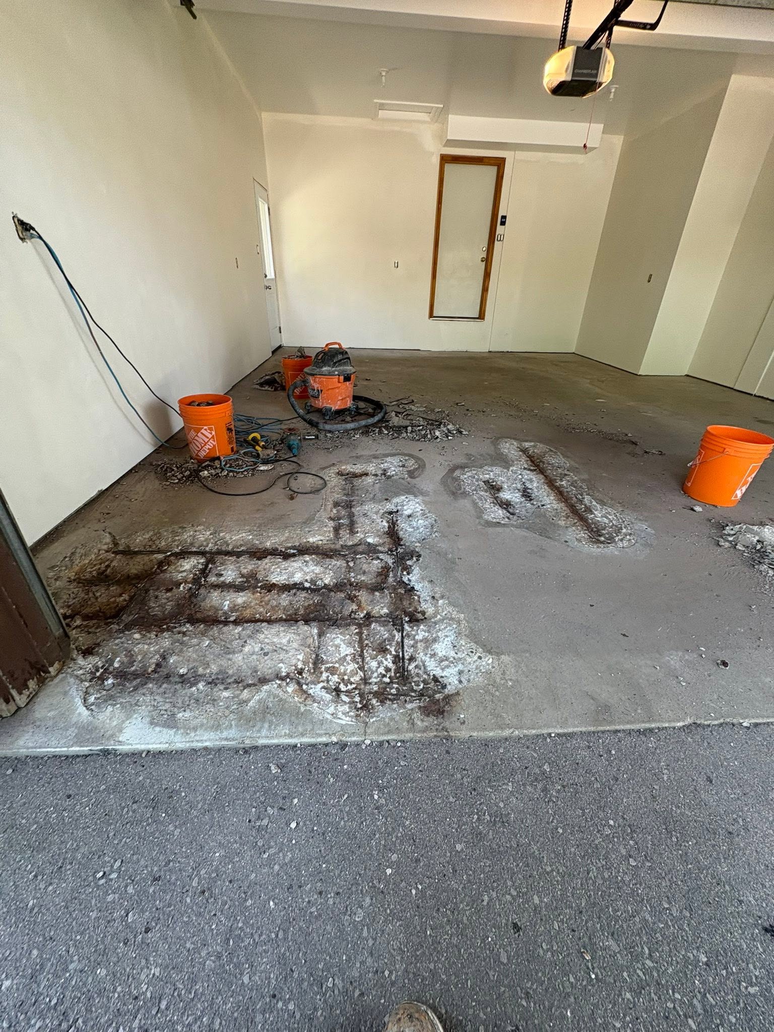Damaged garage concrete before Cipkar Epoxy coating